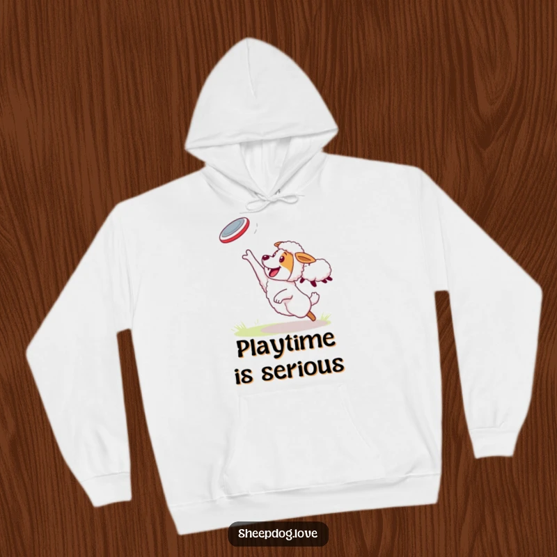 Funny Sheepdog Hoodie: An energetic sheepdog catching a frisbee thrown by a sheep, a moment of pure, funny action.
